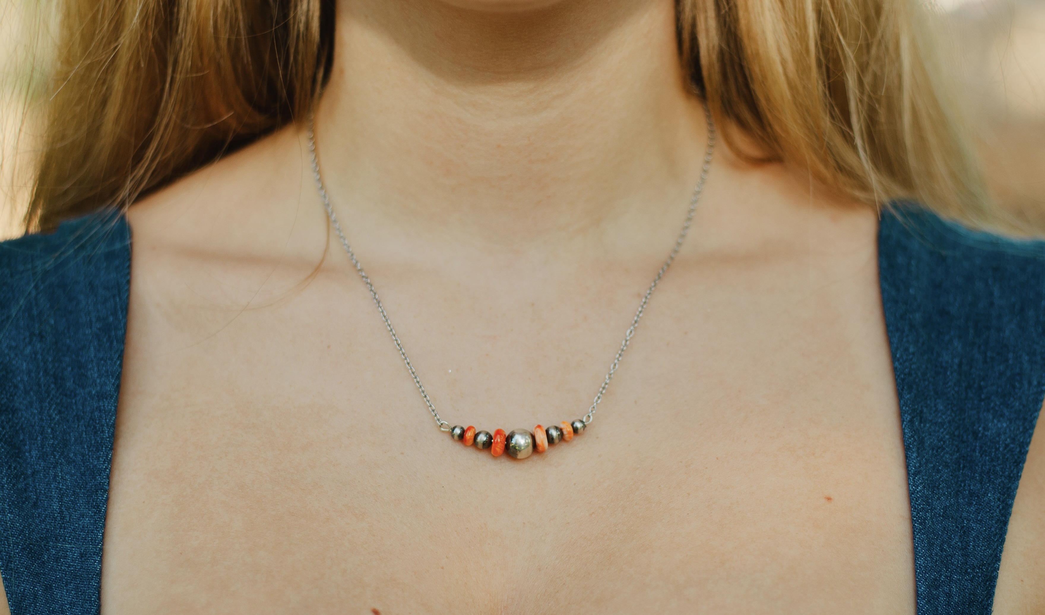 The Pistol orange and silver game day necklace